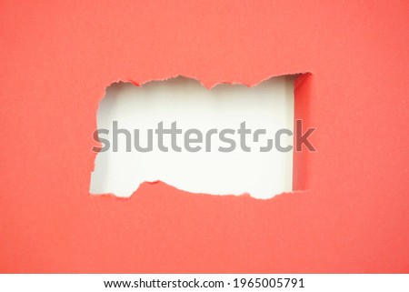 Torn paper, one sheet of torn paper with red color. multicolored torn background concept.
