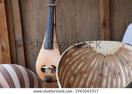 Making musical instruments on craft workshop. Oud, kemenche and pumpkin violin making. handmade musical instrument making in a musical instruments factory
