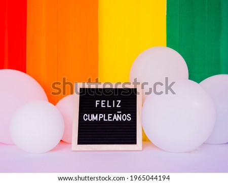 Happy Birthday Colorfull Background with white ballons and a Sign