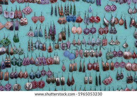 Gift authentic earrings in various colors and designs