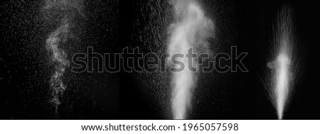 Set of different curly white steam and splashing water splashing isolated on black background. Abstract background, design element. Evaporation of liquid and condensation. Royalty-Free Stock Photo #1965057598