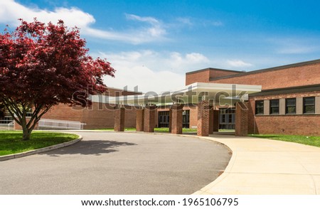 Exterior view of a typical American school Royalty-Free Stock Photo #1965106795