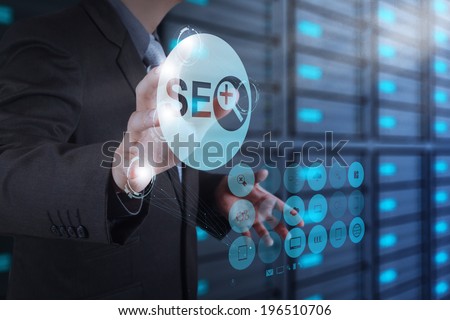 businessman hand showing search engine optimization SEO icon as concept 