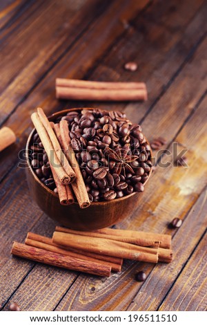 Coffee beans and spices. Selective focus. Toned image.