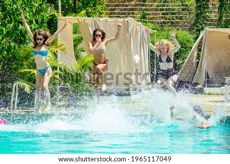 aquamarine color swimmingpool friends chillout in hot summer