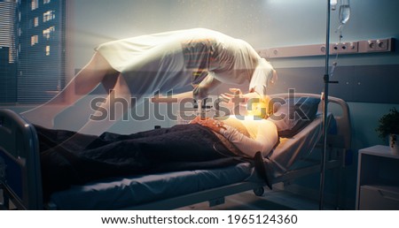 Soul leaving dead patient in hospital Royalty-Free Stock Photo #1965124360