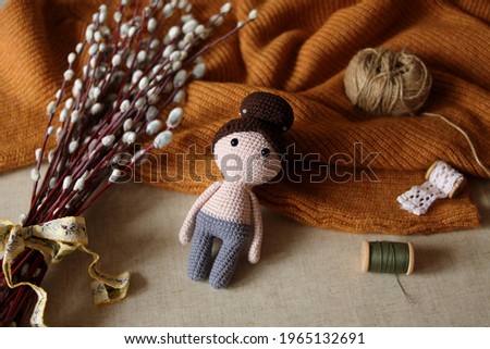 Amigurumi doll. Crochet toys. Stuffed doll without cloth. Easter flatlay. 