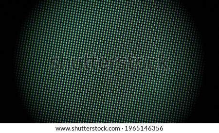 Close up of an LCD screen with a heavy vignette 