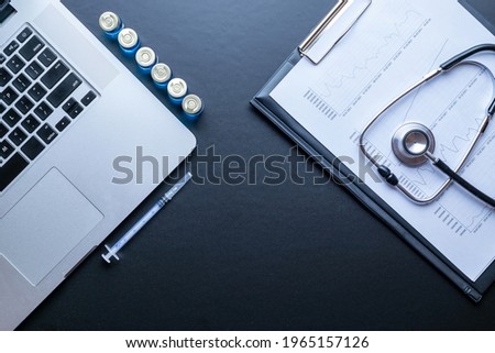 Doctor workplace. Healthcare medical infographic, doctor health stethoscope and notebook, needle syringe on dark background. Health care, insurance and help concept