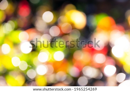 Christmas background. Festive abstract background with bokeh defocused lights and stars
