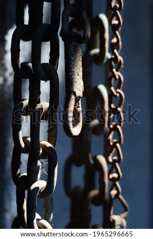 selective focus of old metal rusty chains