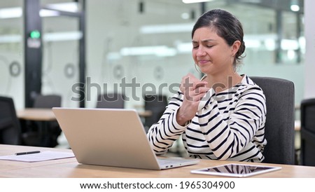 Stressed Indian Woman Working on Laptop having Wrist Pain 