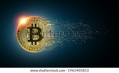 Disintegration of a BTC bitcoin, Cryptocurrency collapse related conceptual. Royalty-Free Stock Photo #1965405853