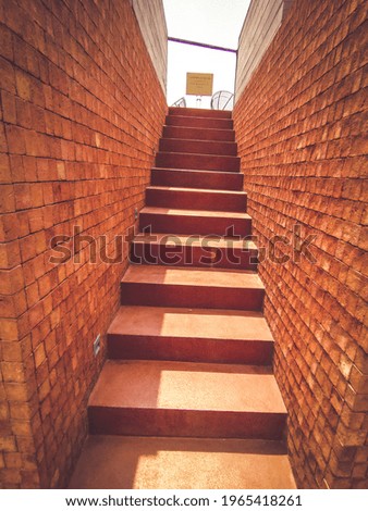 red brick stair with no entry sign at the ends