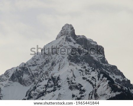 Rocky snowy alpine peak Mürtschenstock (Muertschenstock or Murtschenstock) during winter in the Swiss Alps mountain massif, Amden - Canton of St. Gallen, Switzerland (Schweiz)