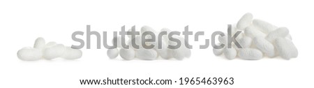 Set with natural silkworm cocoons on white background. Banner design Royalty-Free Stock Photo #1965463963