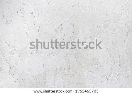 concrete wall. Plastered textured piece of wall. White gray texture.