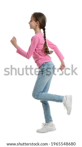 Cute little girl running on white background