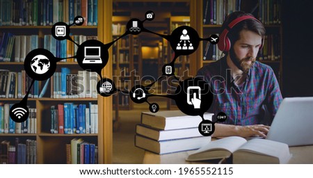 Bubbles with icons of devices and connections over caucasian man sitting at library with laptop. global technology, data processing and digital interface concept digitally generated image.