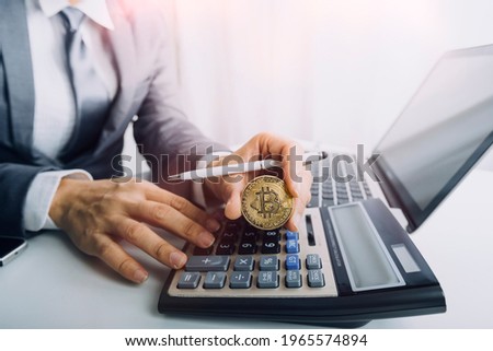 bookkeeper using calculator counting finances taxes fees accounting calculate bills money planning budget loan payment concept pay online on computer do paperwork work at home office desk