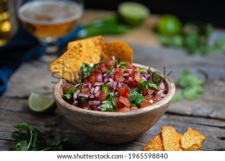 Fresh bowl of homemade salsa pico de gallo, mexican cuisine