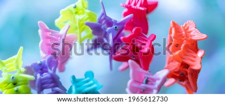colorful butterfly shaped hair clips  Royalty-Free Stock Photo #1965612730