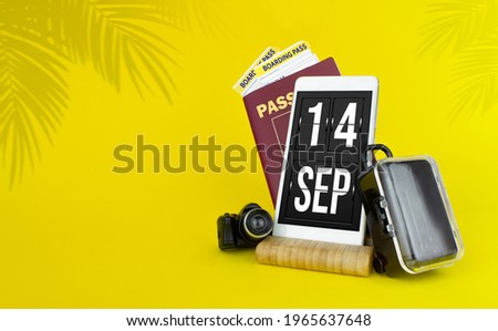 September 14th. Day 14 of month, Calendar date. Mechanical calendar display on your smartphone. The concept of travel.  Autumn month, day of the year concept