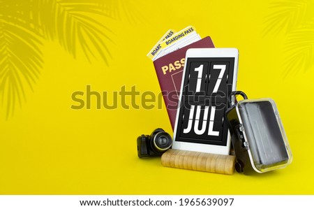 July 17th. Day 17 of month, Calendar date. Mechanical calendar display on your smartphone. The concept of travel.  Summer month, day of the year concept