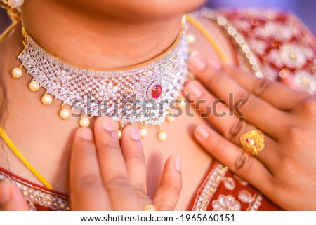 Getting Ready Shots of Bride and Groom for Reception. South Indian Reception Jewellery Closeup.