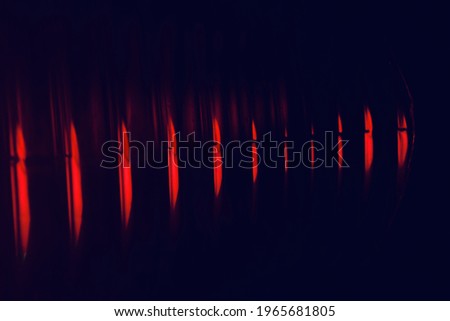 Reddish blurry lights pattern background photo