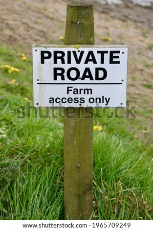 A sign to indicate that this is a private road and farm access only