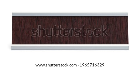 Wood Desk Name Plate with Copy Space Cut Out. Royalty-Free Stock Photo #1965716329