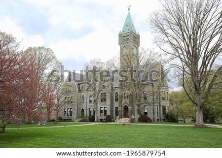 Taylor Hall of Bryn Mawr College on a cloudy day in early spring, Bryn Mawr, Pennsylvania, USA Royalty-Free Stock Photo #1965879754