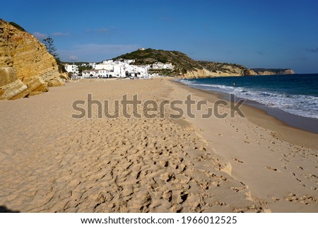 beautiful empty beach of Salema in Portugal Algarve during off season                             
