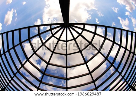 Metal construction on blue sunny sky background