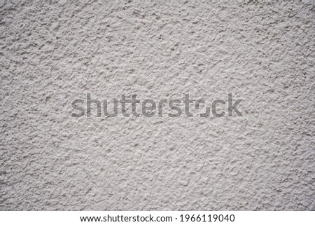 Plaster render as a background with strong structure, Mineral photographed in daylight                          
