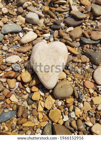A heart shaped stone in the Adriatic sea in Italy