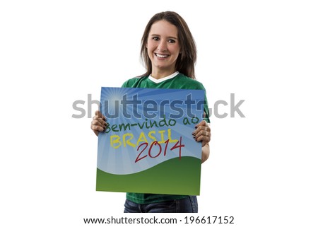 Female Mexican Fan holding a welcome to Brazil sign in portuguese, on a white background.