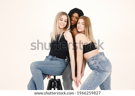 Portrait of attractive young women on a white background