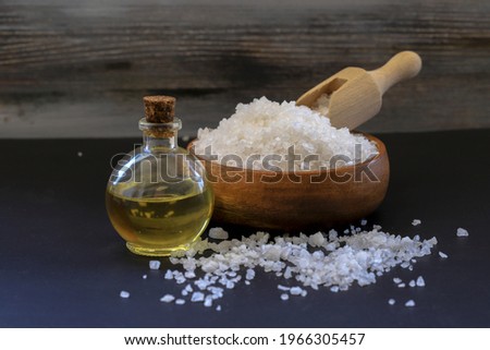 Natural rock salt, and essential oil derived from salt. Essential oil used in massage, spa.