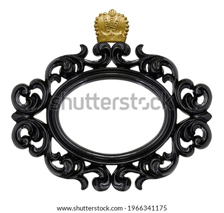 Wooden black oval frame with golden crown for paintings, mirrors or photo isolated on white background. Design element with clipping path