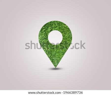 Green Destination Symbol of a pin. Environment day concept. Green location symbol of a pin. A green forest shape on location pin concept of green place for tourist visit. World Forestry Day. 