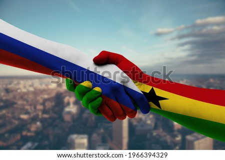Shaking hands Russia and Ghana