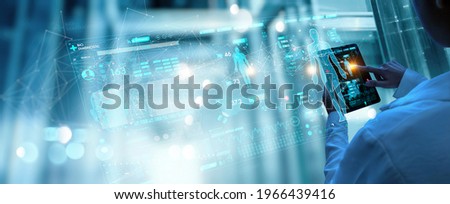 Medicine doctor working digital tablet for medical record of patient on interface. DNA.medical technology and futuristic concept.Digital healthcare and network on modern virtual screen. Royalty-Free Stock Photo #1966439416