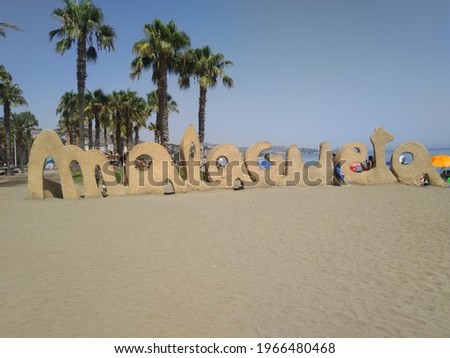 sand sculpture style sign for la Malagueta beach in Malaga 
