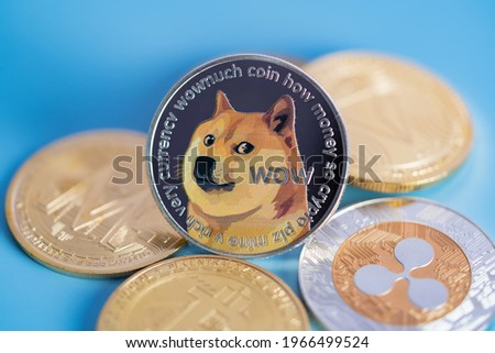 Dogecoin DOGE group included with Cryptocurrency coin bitcoin, Ethereum ETH, Binance Coin, Zcash TRON symbol Virtual blockchain technology future is money concept Close up and Macro photography Royalty-Free Stock Photo #1966499524