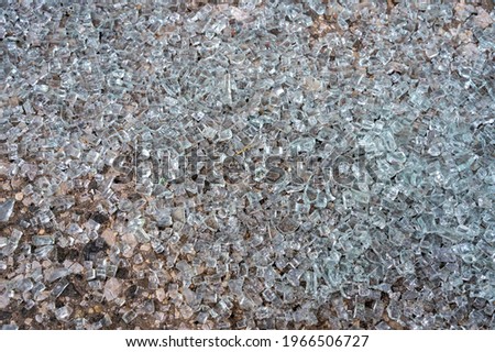 Broken glass.Windshield.Crystals Background.Blue colors.Car window. Royalty-Free Stock Photo #1966506727