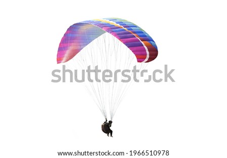 The sportsman flying on a paraglider. Beautiful paraglider in flight on a white background. isolated Royalty-Free Stock Photo #1966510978