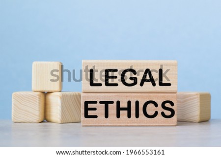 LEGAL ETHICS. WOODEN BARS with information on the desktop.