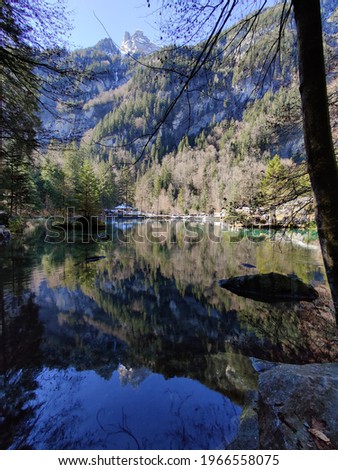 Blausee is a small lake, in Switzerland, in the Kander valley, known for the amazing blue colour of its water